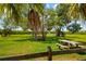 Lush park picnic area featuring shaded picnic tables, perfect for outdoor enjoyment at 1862 Rita St, Sarasota, FL 34231