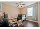 Bedroom setup with a desk and computer, suitable for work or study space at 18620 Cortes Creek Blvd, Spring Hill, FL 34610