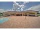 Beautiful clubhouse offers covered seating and gathering areas and a pool for relaxing at 18620 Cortes Creek Blvd, Spring Hill, FL 34610