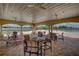 This clubhouse features interior seating and views of the pool and surrounding community at 18620 Cortes Creek Blvd, Spring Hill, FL 34610