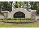Community sign for Talavera with manicured landscaping at 18620 Cortes Creek Blvd, Spring Hill, FL 34610