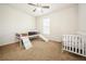Spacious bedroom featuring a unique bunkbed with slides and a crib, ideal for a play area at 1905 Via Napoli St, Plant City, FL 33566