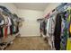 Walk-in closet with metal shelving and ample space for clothing and storage at 1905 Via Napoli St, Plant City, FL 33566