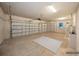 Spacious two-car garage with lighting and ample room for parking and storage at 1905 Via Napoli St, Plant City, FL 33566
