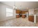 Spacious kitchen featuring stainless steel appliances, a center island, and granite countertops at 1905 Via Napoli St, Plant City, FL 33566