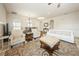 Inviting living room featuring a cozy seating arrangement and adjacent dining area at 1905 Via Napoli St, Plant City, FL 33566