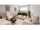 Bright home office with desk, decor, and comfortable seating area at 1905 Via Napoli St, Plant City, FL 33566