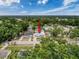 Aerial view of home with lush landscaping, mature trees and a great location at 2214 Elise Marie Dr, Seffner, FL 33584