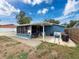Relax in the beautiful backyard with attached screened in porch and grill at 2214 Elise Marie Dr, Seffner, FL 33584
