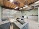 Garage features a seating area, roll-up doors for access, and ample space at 2214 Elise Marie Dr, Seffner, FL 33584