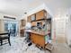 Open concept kitchen with granite countertops, a kitchen island, and stainless steel appliances at 2214 Elise Marie Dr, Seffner, FL 33584