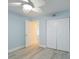 Bright bedroom with new wood flooring, spacious closet and ensuite bath at 2424 Placida Rd # D102, Englewood, FL 34224