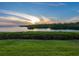 Scenic view of the water and mangroves at sunset at 2424 Placida Rd # D102, Englewood, FL 34224