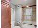 Well-lit bathroom with a shower-tub combo and a classic white toilet at 2425 Gulf Of Mexico Dr # 14B, Longboat Key, FL 34228