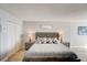 Cozy bedroom with soft lighting, a comfortable bed, and ample closet space at 2425 Gulf Of Mexico Dr # 14B, Longboat Key, FL 34228