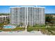 Luxurious beachfront condos offering a pool, beach access, and a serene coastal lifestyle at 2425 Gulf Of Mexico Dr # 14B, Longboat Key, FL 34228