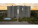 Beachfront high-rise condo offers a pool, beach access, and lush landscaping for resort-style living at 2425 Gulf Of Mexico Dr # 14B, Longboat Key, FL 34228