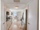 Open kitchen view to dining area with water views at 2425 Gulf Of Mexico Dr # 14B, Longboat Key, FL 34228
