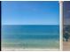 Stunning beach view from a window at 2425 Gulf Of Mexico Dr # 14B, Longboat Key, FL 34228