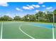 Community basketball court featuring well-maintained surfaces, hoops, and ample space for games and recreational activities at 2524 Tuttle Way, Sarasota, FL 34239