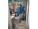Bathroom featuring a turtle-themed shower curtain, matching toilet seat, and tiled floor at 2787 Jay Pl, Sarasota, FL 34235