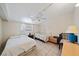 Inviting bedroom with ceiling fan and tile flooring for comfortable living at 2820 Greenbriar St, Sarasota, FL 34237