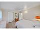 Inviting bedroom features tiled floors, simple decor, and a light, airy ambiance at 2820 Greenbriar St, Sarasota, FL 34237
