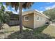 The exterior of the home shows a view of the backyard with a screened-in patio at 2820 Greenbriar St, Sarasota, FL 34237