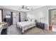 Bright bedroom featuring gray walls, soft carpet, and natural light at 304 34Th W St, Bradenton, FL 34205