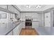 Bright kitchen with ample cabinet space, stainless steel appliances, and modern countertops at 304 34Th W St, Bradenton, FL 34205