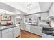 Bright kitchen featuring modern appliances and an open view to the dining area at 304 34Th W St, Bradenton, FL 34205