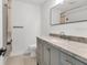 Bathroom featuring modern vanity with marble countertop and sleek fixtures at 3328 Kingswood Dr, Sarasota, FL 34232