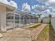 This home features a screened-in pool and patio area perfect for outdoor entertaining and relaxation at 3328 Kingswood Dr, Sarasota, FL 34232