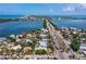 Breathtaking aerial view of a waterfront property showcasing the neighborhood and ocean views at 335 Arthur Dr, Sarasota, FL 34236