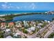 Stunning aerial view of coastal homes near a bay and ocean, showcasing the waterfront community at 335 Arthur Dr, Sarasota, FL 34236
