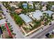 Aerial shot showing a modern home with a unique courtyard pool design and tropical landscaping at 335 Arthur Dr, Sarasota, FL 34236