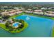 An aerial view of the community lake and pool at 3402 Parkridge Cir, Sarasota, FL 34243