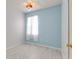Bright bedroom featuring beach-themed decor, including seashell-printed curtains at 3402 Parkridge Cir, Sarasota, FL 34243