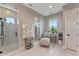 Well-lit bathroom featuring a glass shower, decorative accents, and calming colors at 3574 Recurve Cir, Sarasota, FL 34240