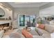 Cozy living room with sliding glass doors offering views of the outdoors at 3574 Recurve Cir, Sarasota, FL 34240