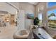 Stylish office space with large windows, modern furniture, and an open doorway at 3574 Recurve Cir, Sarasota, FL 34240