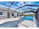 Stunning pool with a screened lanai offering both sunny and shaded areas for relaxation and entertaining guests at 3574 Recurve Cir, Sarasota, FL 34240