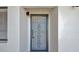 Close up of the decorative security door in a white door frame at 3630 Gulf Of Mexico Dr # 202, Longboat Key, FL 34228