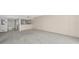 Spacious living room with an open floorplan with a view of the kitchen at 3630 Gulf Of Mexico Dr # 202, Longboat Key, FL 34228