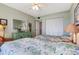Nicely decorated bedroom with twin beds, dresser, and a well-lit closet for storage at 3806 Gulf Of Mexico Dr # C204, Longboat Key, FL 34228