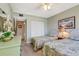 Charming bedroom with twin beds, closet, and light-colored walls and carpet at 3806 Gulf Of Mexico Dr # C204, Longboat Key, FL 34228