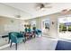 Condo lobby featuring a wall mirror, seating, decorations, and an exit door with a large glass window at 3806 Gulf Of Mexico Dr # C204, Longboat Key, FL 34228