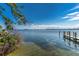Scenic waterfront view from the property featuring clear blue skies and calm waters at 3806 Gulf Of Mexico Dr # C204, Longboat Key, FL 34228