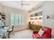 Inviting office space with custom built-ins, hardwood floors, and bright window at 3921 Maravic Pl, Sarasota, FL 34231