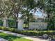 The Huntington Pointe community entrance with lush landscaping and signage at 4257 Hearthstone Dr, Sarasota, FL 34238